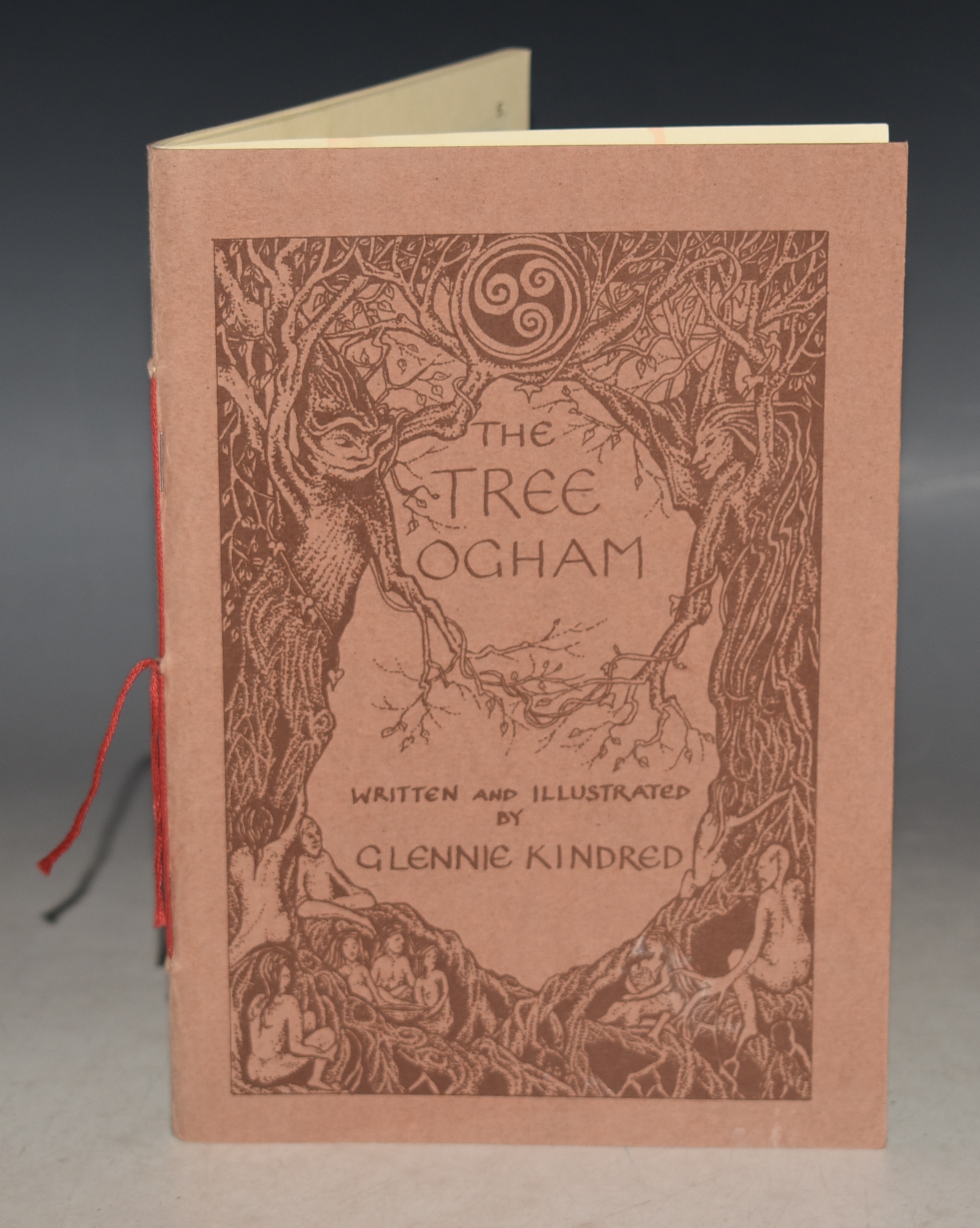 The Tree Ogham Written and Illustrated by Glennie Kindred.